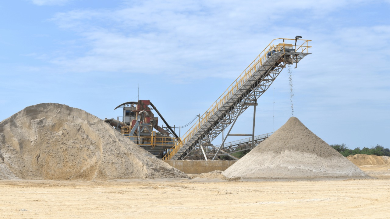 Limestone aggregate plant and sand stockpiles